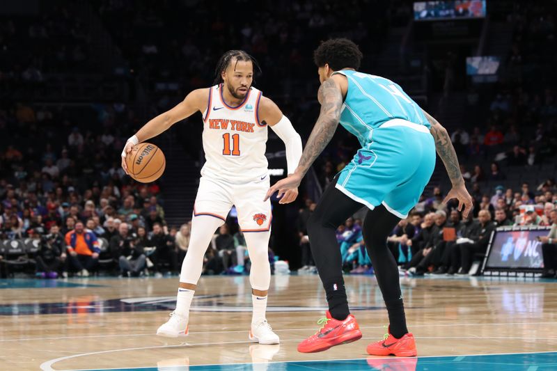 CHARLOTTE, NC - JANUARY 29:  Jalen Brunson #11 of the New York Knicks handles the ball during the game  against the Charlotte Hornets on January 29, 2024 at Spectrum Center in Charlotte, North Carolina. NOTE TO USER: User expressly acknowledges and agrees that, by downloading and or using this photograph, User is consenting to the terms and conditions of the Getty Images License Agreement.  Mandatory Copyright Notice:  Copyright 2024 NBAE (Photo by Brock Williams-Smith/NBAE via Getty Images)