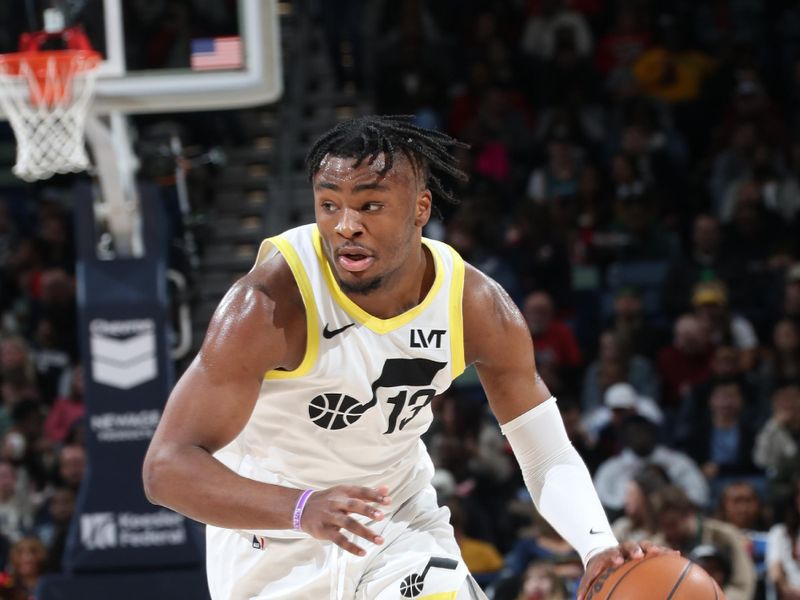 NEW ORLEANS, LA - JANUARY 17:  Isaiah Collier #13 of the Utah Jazz dribbles the ball during the game against the New Orleans Pelicans on January 17, 2025 at the Smoothie King Center in New Orleans, Louisiana. NOTE TO USER: User expressly acknowledges and agrees that, by downloading and or using this Photograph, user is consenting to the terms and conditions of the Getty Images License Agreement. Mandatory Copyright Notice: Copyright 2025 NBAE (Photo by Layne Murdoch Jr./NBAE via Getty Images)