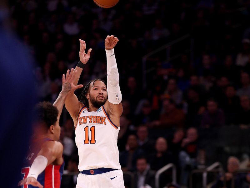 NEW YORK, NEW YORK - NOVEMBER 30:  Jalen Brunson #11 of the New York Knicks shoots a three point shot in the second quarter against the Detroit Pistons at Madison Square Garden on November 30, 2023 in New York City. NOTE TO USER: User expressly acknowledges and agrees that, by downloading and or using this photograph, User is consenting to the terms and conditions of the Getty Images License Agreement. (Photo by Elsa/Getty Images)