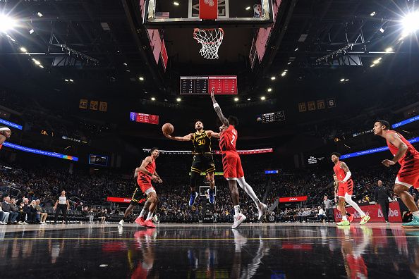 SAN FRANCISCO, CA - DECEMBER 23: Stephen Curry #30 of the Golden State Warriors shoots the ball during the game against the Portland Trail Blazers on December 23, 2023 at Chase Center in San Francisco, California. NOTE TO USER: User expressly acknowledges and agrees that, by downloading and or using this photograph, user is consenting to the terms and conditions of Getty Images License Agreement. Mandatory Copyright Notice: Copyright 2023 NBAE (Photo by Noah Graham/NBAE via Getty Images)