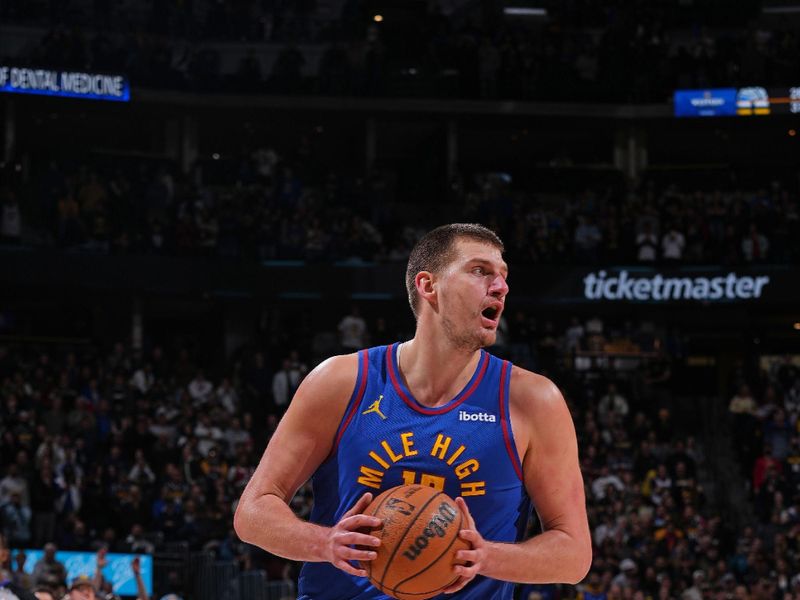 DENVER, CO - JANUARY 5: Nikola Jokic #15 of the Denver Nuggets handles the ball during the game against the Orlando Magic on January 5, 2024 at the Ball Arena in Denver, Colorado. NOTE TO USER: User expressly acknowledges and agrees that, by downloading and/or using this Photograph, user is consenting to the terms and conditions of the Getty Images License Agreement. Mandatory Copyright Notice: Copyright 2024 NBAE (Photo by Bart Young/NBAE via Getty Images)