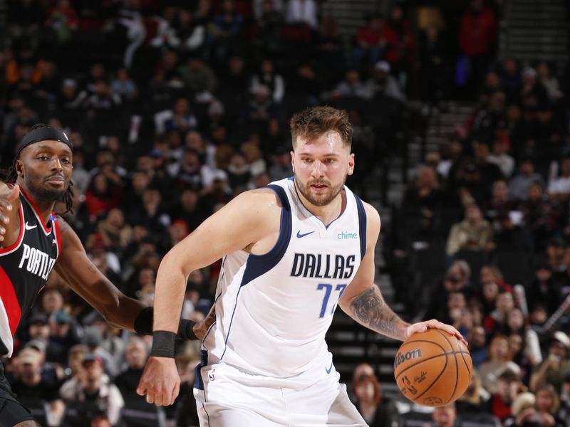 PORTLAND, OR - DECEMBER 1: Luka Doncic #77 of the Dallas Mavericks handles the ball during the game against the Portland Trail Blazers on December 1, 2024 at the Moda Center Arena in Portland, Oregon. NOTE TO USER: User expressly acknowledges and agrees that, by downloading and or using this photograph, user is consenting to the terms and conditions of the Getty Images License Agreement. Mandatory Copyright Notice: Copyright 2024 NBAE (Photo by Cameron Browne/NBAE via Getty Images)