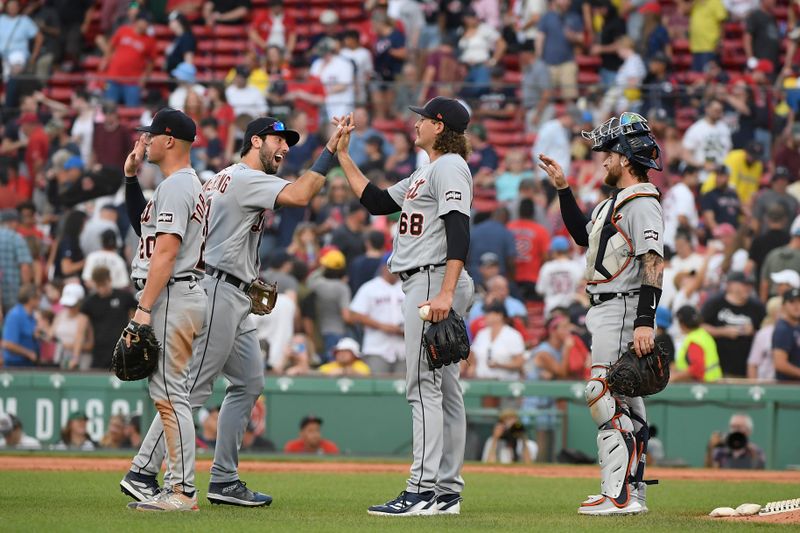 Aug 12, 2023; Boston, Massachusetts, USA;  The Detroit Tigers celebrate after defeating the Boston Red Sox at Fenway Park. Mandatory Credit: Bob DeChiara-USA TODAY Sports