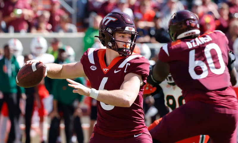 Oct 15, 2022; Blacksburg, Virginia, USA;  Virginia Tech Hokies quarterback Grant Wells (6) throws a pass during the first quarter against the Miami Hurricanes at Lane Stadium. Mandatory Credit: Reinhold Matay-USA TODAY Sports