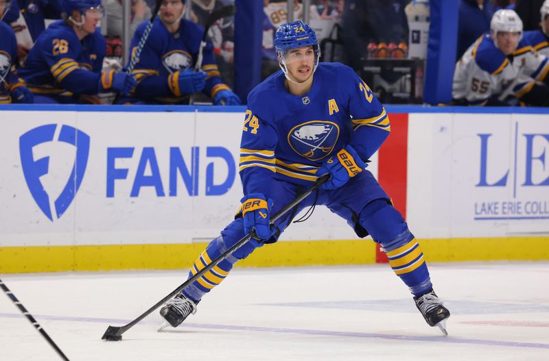 Nov 14, 2024; Buffalo, New York, USA;  Buffalo Sabres center Dylan Cozens (24) looks to make a pass during the second period against the St. Louis Blues at KeyBank Center. Mandatory Credit: Timothy T. Ludwig-Imagn Images