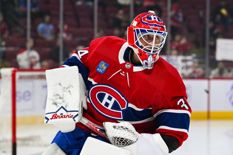 Nov 12, 2023; Montreal, Quebec, CAN; Montreal Canadiens goalie Jake Allen (34) looks on during warm-up before the game against the Vancouver Canucks at Bell Centre. Mandatory Credit: David Kirouac-USA TODAY Sports