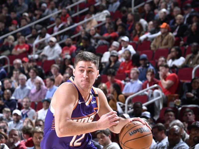 HOUSTON, TX - FEBRUARY 12: Collin Gillespie #12 of the Phoenix Suns drives to the basket during the game against the Houston Rockets on February 12, 2025 at the Toyota Center in Houston, Texas. NOTE TO USER: User expressly acknowledges and agrees that, by downloading and or using this photograph, User is consenting to the terms and conditions of the Getty Images License Agreement. Mandatory Copyright Notice: Copyright 2025 NBAE (Photo by Logan Riely/NBAE via Getty Images)