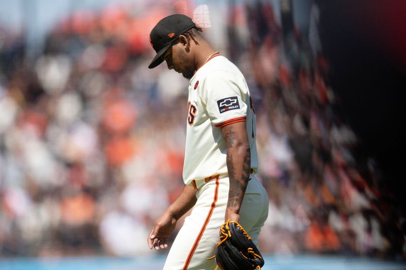 Jul 14, 2024; San Francisco, California, USA; San Francisco Giants pitcher Camilo Doval (75) walks off the field after being relieved against the Minnesota Twins during the ninth inning at Oracle Park. Mandatory Credit: D. Ross Cameron-USA TODAY Sports