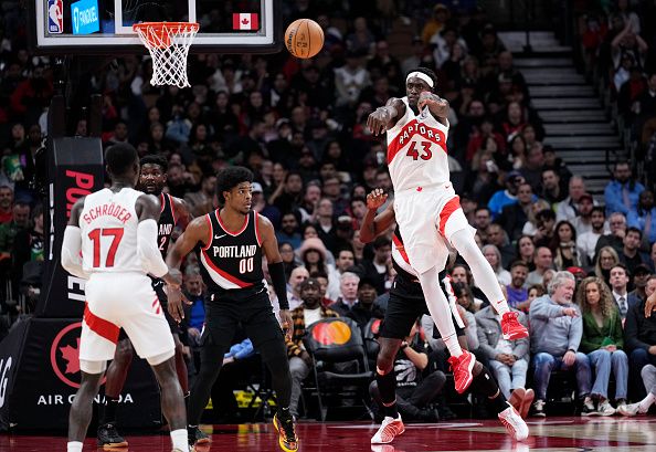 TORONTO, ON - OCTOBER 30: Pascal Siakam #43 of the Toronto Raptors passes the ball off against the Portland Trail Blazers during the first half of their basketball game at the Scotiabank Arena on October 30, 2023 in Toronto, Ontario, Canada. NOTE TO USER: User expressly acknowledges and agrees that, by downloading and/or using this Photograph, user is consenting to the terms and conditions of the Getty Images License Agreement. (Photo by Mark Blinch/Getty Images)