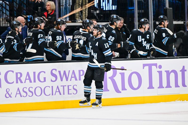 Nov 29, 2024; Salt Lake City, Utah, USA; Utah Hockey Club center Alexander Kerfoot (15) celebrates after a goal against the Edmonton Oilers at the Delta Center. Mandatory Credit: Christopher Creveling-Imagn Images