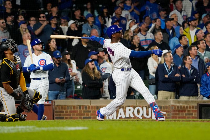 Sep 19, 2023; Chicago, Illinois, USA; Chicago Cubs designated hitter Alexander Canario (4) hits a grand slam home run against the Pittsburgh Pirates during the eighth inning at Wrigley Field. Mandatory Credit: David Banks-USA TODAY Sports