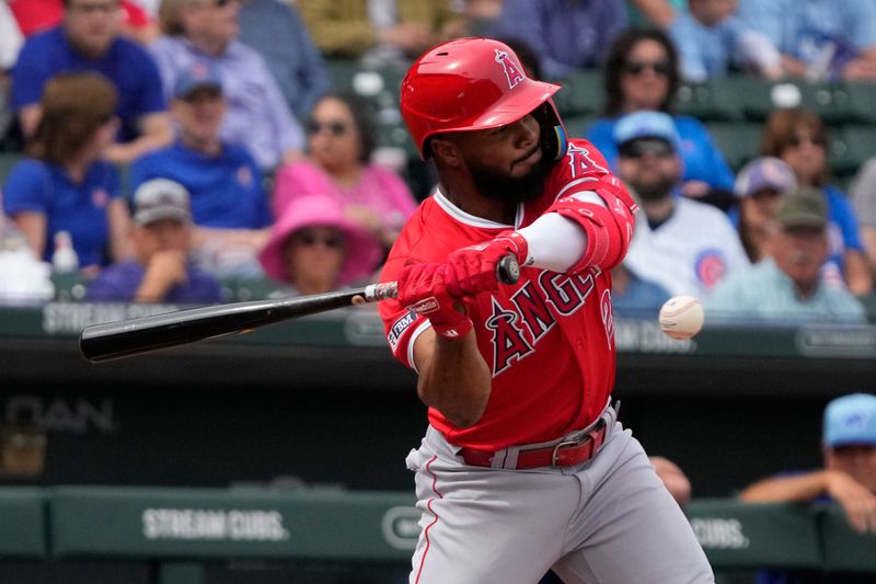 Mar 6, 2024; Mesa, Arizona, USA; Los Angeles Angels second baseman Luis Rengifo (2) hits against the Chicago Cubs in the first inning at Sloan Park. Mandatory Credit: Rick Scuteri-USA TODAY Sports