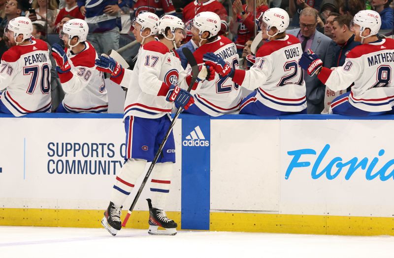 Mar 2, 2024; Tampa, Florida, USA; Montreal Canadiens right wing Josh Anderson (17) is congratulated by teammates after scoring a goal against the Tampa Bay Lightning during the third period at Amalie Arena. Mandatory Credit: Kim Klement Neitzel-USA TODAY Sports