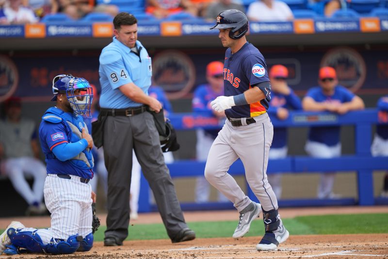 Mar 23, 2024; Port St. Lucie, Florida, USA;  Houston Astros third baseman Alex Bregman (2) crosses home plate after hitting a three-run home run against the New York Mets in the first inning at Clover Park. Mandatory Credit: Jim Rassol-USA TODAY Sports