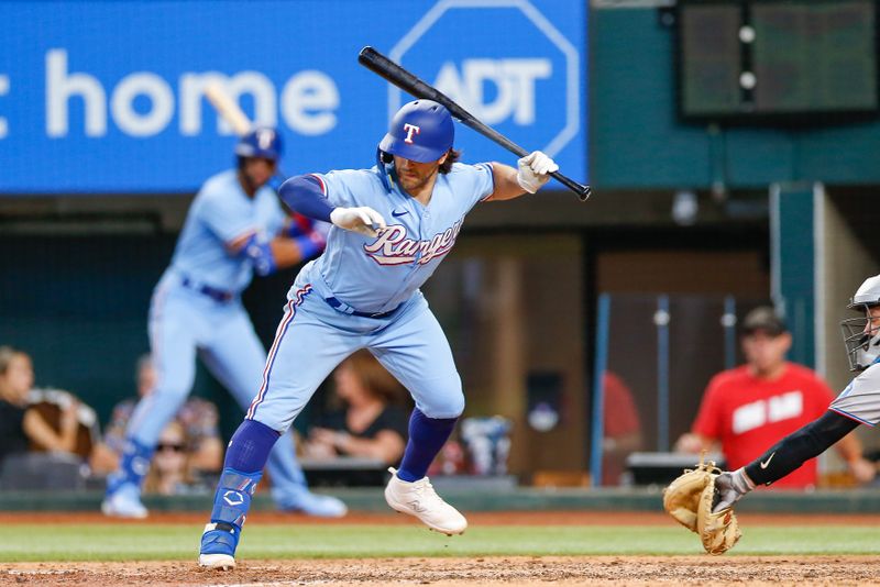 Aug 6, 2023; Arlington, Texas, USA; Texas Rangers shortstop Josh Smith (47) jumps away from an inside pitch during the eighth inning against the Miami Marlins at Globe Life Field. Mandatory Credit: Andrew Dieb-USA TODAY Sports