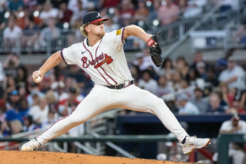 Aug 22, 2024; Cumberland, Georgia, USA; Atlanta Braves pitcher Spencer Schwellenbach (56) pitches the ball against Atlanta Braves during the third inning at Truist Park. Mandatory Credit: Jordan Godfree-USA TODAY Sports