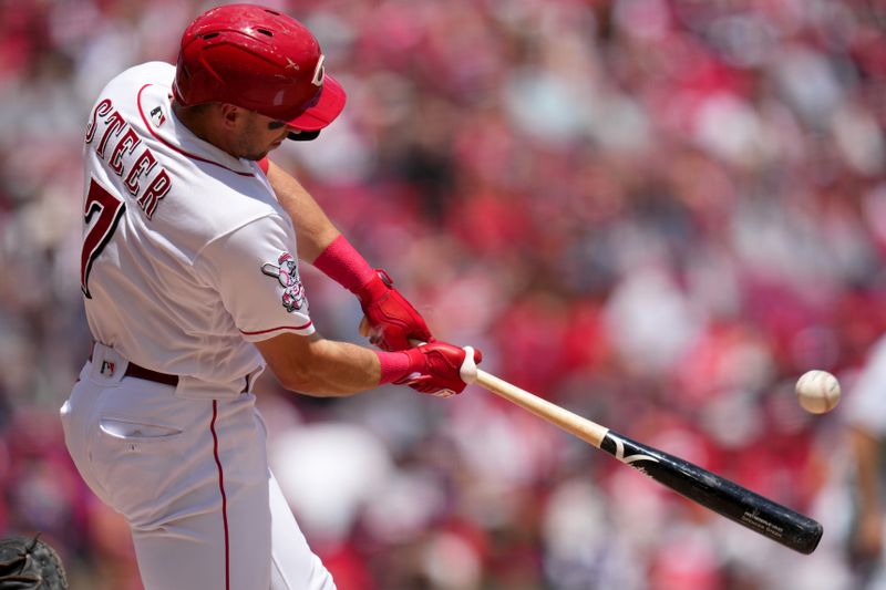 Jun 25, 2023; Cincinnati, Ohio, USA; Cincinnati Reds first baseman Spencer Steer (7) hits a one-run double in the third inning against the Atlanta Braves at Great American Ball Park. The Atlanta Braves won, 7-6. Mandatory Credit: Kareem Elgazzar-USA TODAY Sports