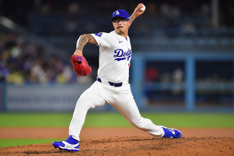 May 31, 2024; Los Angeles, California, USA; Los Angeles Dodgers pitcher Anthony Banda (43) throws against the Colorado Rockies during the seventh inning at Dodger Stadium. Mandatory Credit: Gary A. Vasquez-USA TODAY Sports