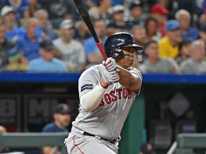 Sep 1, 2023; Kansas City, Missouri, USA;  Boston Red Sox third baseman Rafael Devers (11) singles in the sixth inning against the Kansas City Royals at Kauffman Stadium. Mandatory Credit: Peter Aiken-USA TODAY Sports