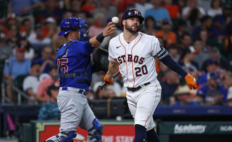 May 17, 2023; Houston, Texas, USA; Houston Astros right fielder Chas McCormick (20) reacts after striking out during the second inning against the Chicago Cubs at Minute Maid Park. Mandatory Credit: Troy Taormina-USA TODAY Sports