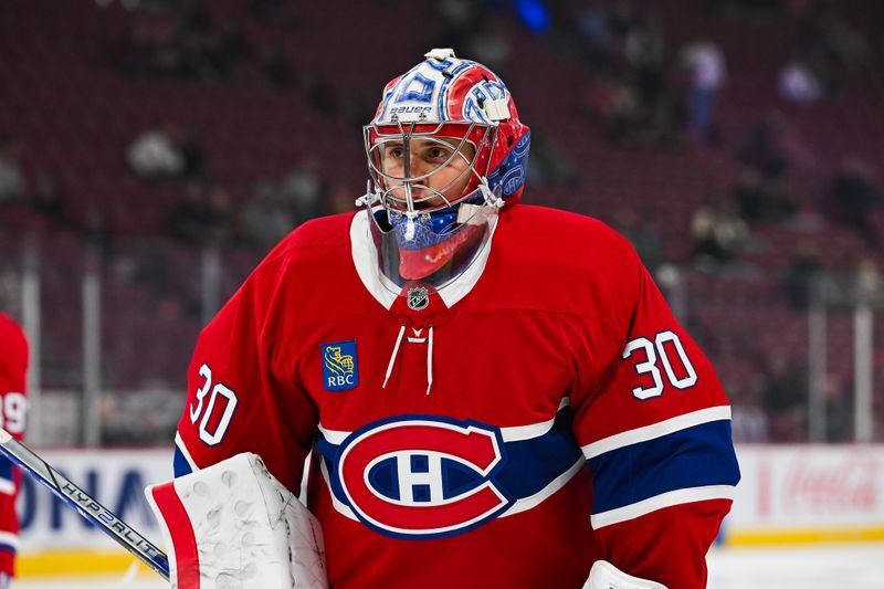 Oct 1, 2024; Montreal, Quebec, CAN; Montreal Canadiens goalie Cayden Primeau (30) looks on during warm-up before the preseason game against the Ottawa Senators at Bell Centre. Mandatory Credit: David Kirouac-Imagn Images