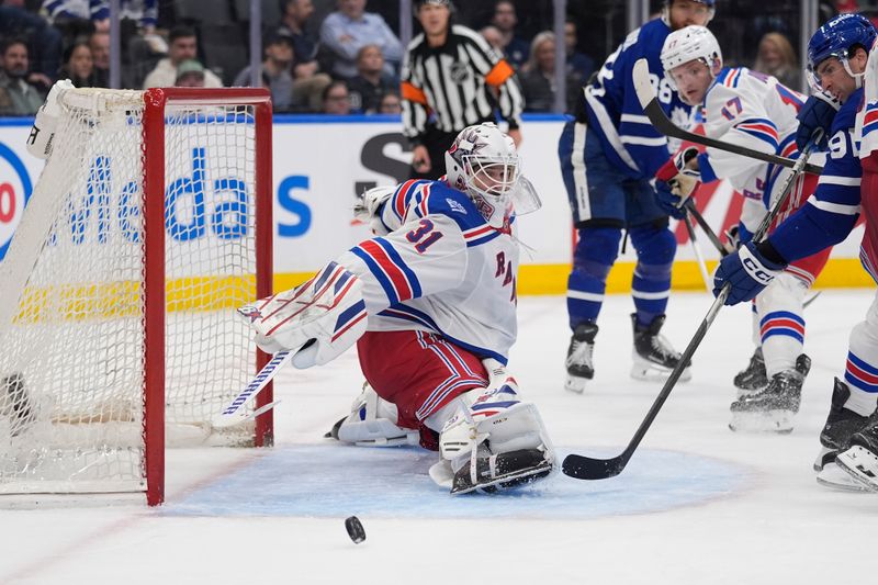 Mar 25, 2026; Toronto, Ontario, CAN; New York Rangers goaltender Igor Shesterkin (31) makes a save against the Toronto Maple Leafs during the third period at Scotiabank Arena. Mandatory Credit: John E. Sokolowski-Imagn Images Mar 25, 2026; Toronto, Ontario, CAN; New York Rangers goaltender Igor Shesterkin (31) makes a save against the Toronto Maple Leafs during the third period at Scotiabank Arena. Mandatory Credit: John E. Sokolowski-Imagn Images