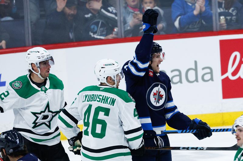 Mar 14, 2025; Winnipeg, Manitoba, CAN;  Winnipeg Jets forward Morgan Barron (36) celebrates his goal against the Dallas Stars during the third period at Canada Life Centre. Mandatory Credit: Terrence Lee-Imagn Images