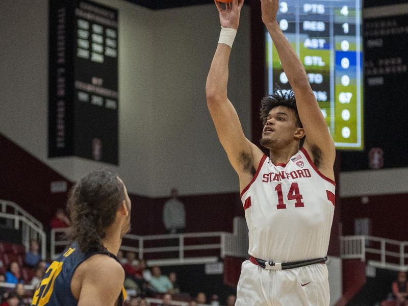 Mar 7, 2024; Stanford, California, USA; Stanford Cardinal forward Spencer Jones (14) shoots a three point basket against California Golden Bears guard Jaylon Tyson (20) during the first half at Maples Pavillion. Mandatory Credit: Neville E. Guard-USA TODAY Sports