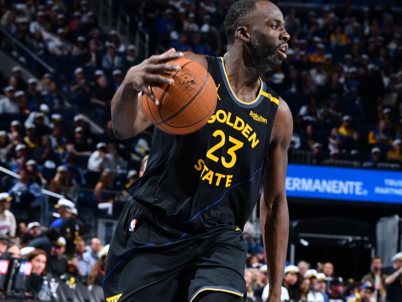 PHOENIX, AZ - NOVEMBER 12: Draymond Green #23 of the Golden State Warriors dribbles the ball during the game against the Dallas Mavericks during the Emirates NBA Cup game on November 12, 2024 at Footprint Center in Phoenix, Arizona. NOTE TO USER: User expressly acknowledges and agrees that, by downloading and or using this photograph, user is consenting to the terms and conditions of the Getty Images License Agreement. Mandatory Copyright Notice: Copyright 2024 NBAE (Photo by Barry Gossage/NBAE via Getty Images)