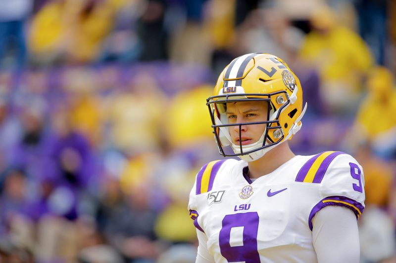 Oct 26, 2019; Baton Rouge, LA, USA; LSU Tigers quarterback Joe Burrow (9) warms up prior to kickoff against the Auburn Tigers at Tiger Stadium. Mandatory Credit: Derick E. Hingle-USA TODAY Sports