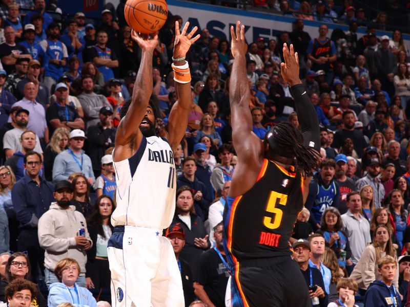 OKLAHOMA CITY, OK - NOVEMBER 17: Kyrie Irving #11 of the Dallas Mavericks shoots a three point basket during the game against the Oklahoma City Thunder on November 17, 2024 at Paycom Center in Oklahoma City, Oklahoma. NOTE TO USER: User expressly acknowledges and agrees that, by downloading and or using this photograph, User is consenting to the terms and conditions of the Getty Images License Agreement. Mandatory Copyright Notice: Copyright 2024 NBAE (Photo by Zach Beeker/NBAE via Getty Images)