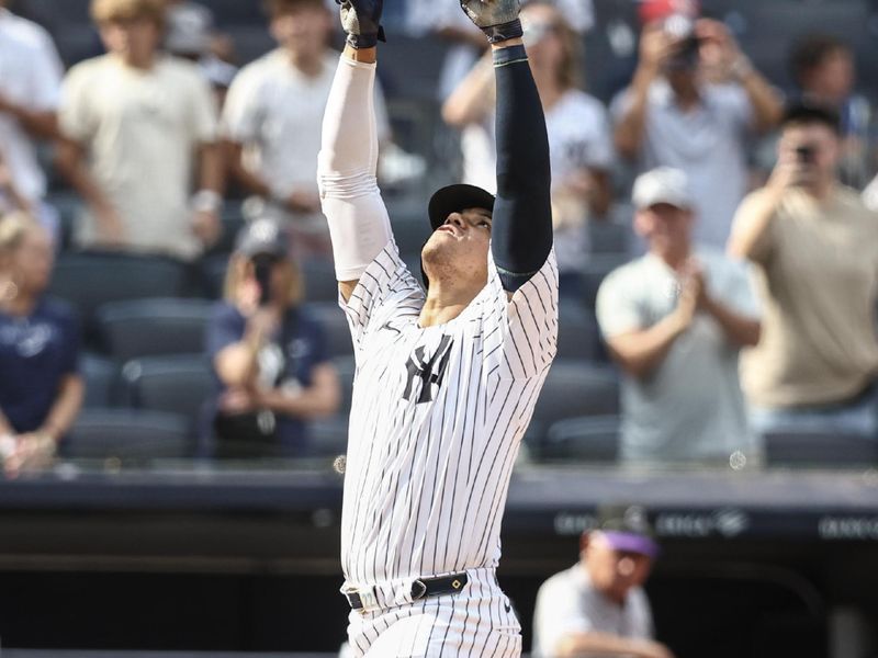 Aug 25, 2024; Bronx, New York, USA;  New York Yankees right fielder Juan Soto (22) gestures after hitting a solo home run in the seventh inning against the Colorado Rockies at Yankee Stadium. Mandatory Credit: Wendell Cruz-USA TODAY Sports