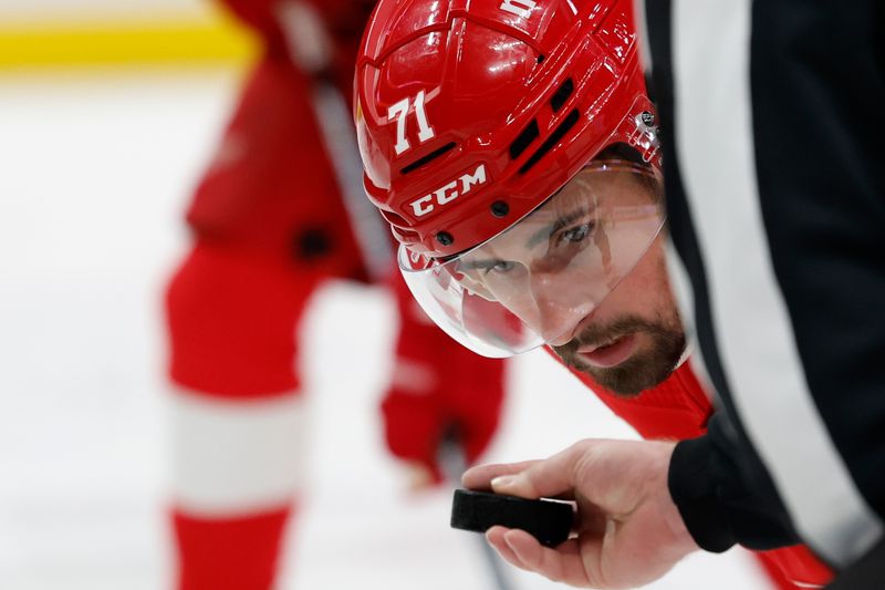 Feb 22, 2024; Detroit, Michigan, USA;  Detroit Red Wings center Dylan Larkin (71) gets set to face off in the second period against the Colorado Avalanche at Little Caesars Arena. Mandatory Credit: Rick Osentoski-USA TODAY Sports