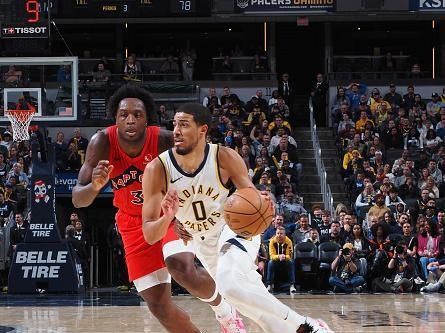 INDIANAPOLIS, IN - NOVEMBER 22: Tyrese Haliburton #0 of the Indiana Pacers dribbles the ball during the game against the Toronto Raptors on November 22, 2023 at Gainbridge Fieldhouse in Indianapolis, Indiana. NOTE TO USER: User expressly acknowledges and agrees that, by downloading and or using this Photograph, user is consenting to the terms and conditions of the Getty Images License Agreement. Mandatory Copyright Notice: Copyright 2023 NBAE (Photo by Ron Hoskins/NBAE via Getty Images)
