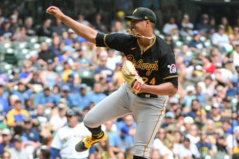 Aug 6, 2023; Milwaukee, Wisconsin, USA;  Pittsburgh Pirates pitcher Johan Oviedo (24) pitches in the seventh inning against the Milwaukee Brewers at American Family Field. Mandatory Credit: Benny Sieu-USA TODAY Sports