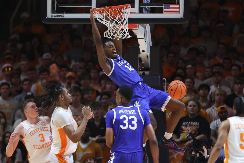 Mar 9, 2024; Knoxville, Tennessee, USA; Kentucky Wildcats guard Antonio Reeves (12) dunks the ball against the Tennessee Volunteers during the second half at Thompson-Boling Arena at Food City Center. Mandatory Credit: Randy Sartin-USA TODAY Sports