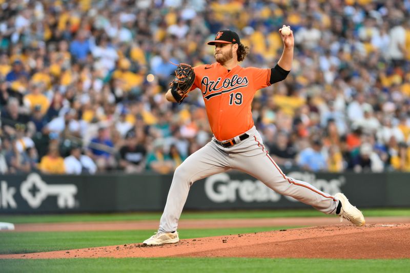 Aug 12, 2023; Seattle, Washington, USA; Baltimore Orioles starting pitcher Cole Irvin (19) pitches to the Seattle Mariners during the second inning at T-Mobile Park. Mandatory Credit: Steven Bisig-USA TODAY Sports