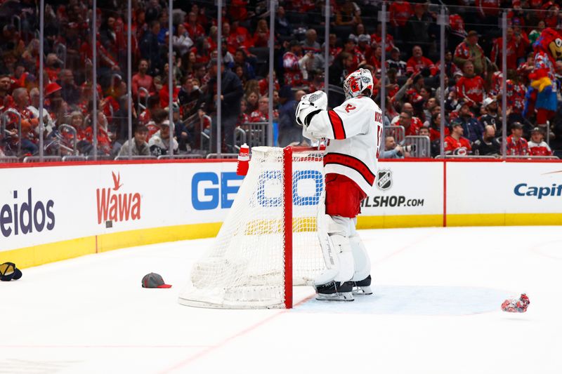 Mar 22, 2024; Washington, District of Columbia, USA; Carolina Hurricanes goaltender Pyotr Kochetkov (52) looks on after a hat trick by Washington Capitals left wing Sonny Milano (not pictured) during the third period at Capital One Arena. Mandatory Credit: Amber Searls-USA TODAY Sports