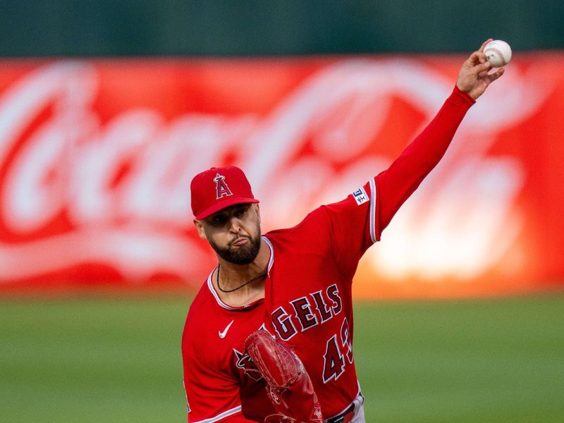 Sep 1, 2023; Oakland, California, USA;  Los Angeles Angels starting pitcher Patrick Sandoval (43) delivers a pitch against the Oakland Athletics during the first inning at Oakland-Alameda County Coliseum. Mandatory Credit: Neville E. Guard-USA TODAY Sports