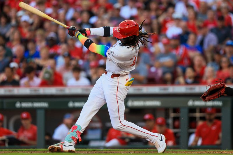 Jun 6, 2024; Cincinnati, Ohio, USA; Cincinnati Reds shortstop Elly De La Cruz (44) hits a three-run home run in the third inning against the Chicago Cubs at Great American Ball Park. Mandatory Credit: Katie Stratman-USA TODAY Sports