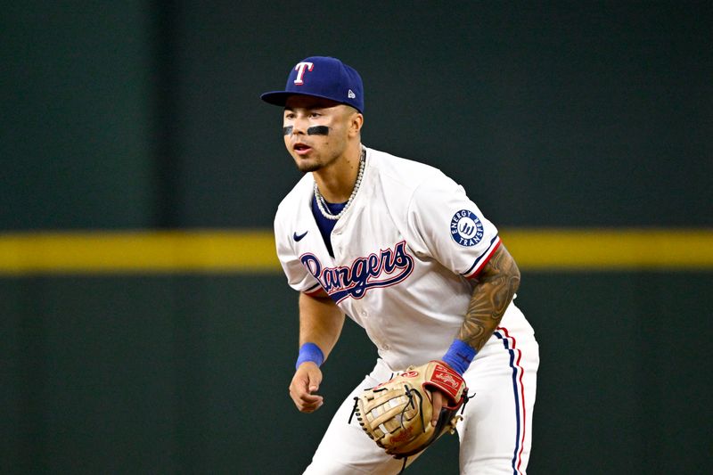 Aug 23, 2025; Arlington, Texas, USA; Texas Rangers second baseman Cody Freeman (39) looks on from second base during the game against the Cleveland Guardians at Globe Life Field. Mandatory Credit: Jerome Miron-Imagn Images