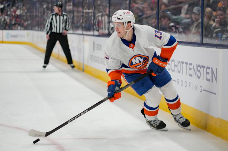 Apr 4, 2024; Columbus, Ohio, USA;  New York Islanders center Mathew Barzal (13) skates with the puck against the Columbus Blue Jackets in the third period at Nationwide Arena. Mandatory Credit: Aaron Doster-USA TODAY Sports