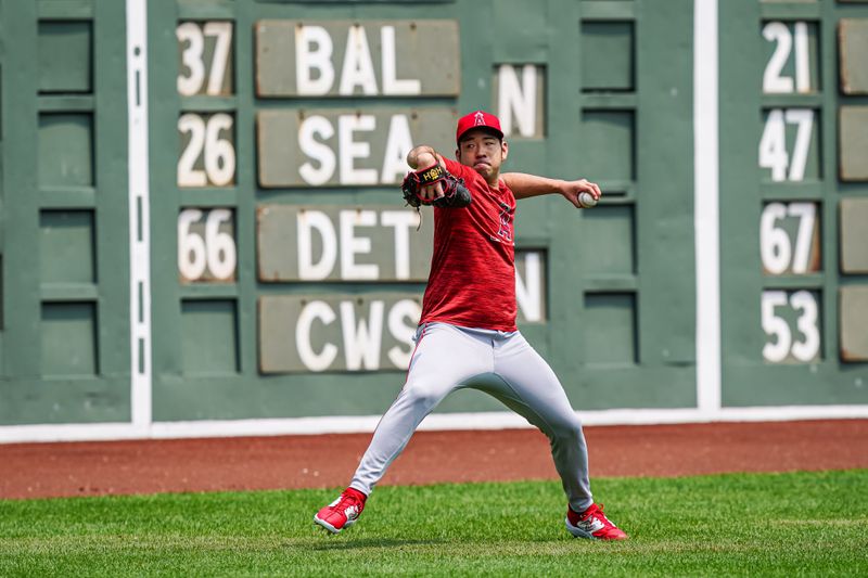Jun 4, 2025; Boston, Massachusetts, USA; Los Angeles Angels pitcher Yusei Kikuchi (16) throws a few pitches before the start of the game against the Boston Red Sox at Fenway Park. Mandatory Credit: David Butler II-Imagn Images