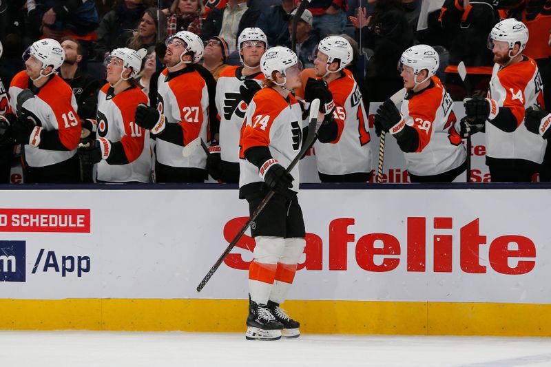 Jan 14, 2025; Columbus, Ohio, USA; Philadelphia Flyers right wing Owen Tippett (74) celebrates his goal against the Columbus Blue Jackets during the third period at Nationwide Arena. Mandatory Credit: Russell LaBounty-Imagn Images