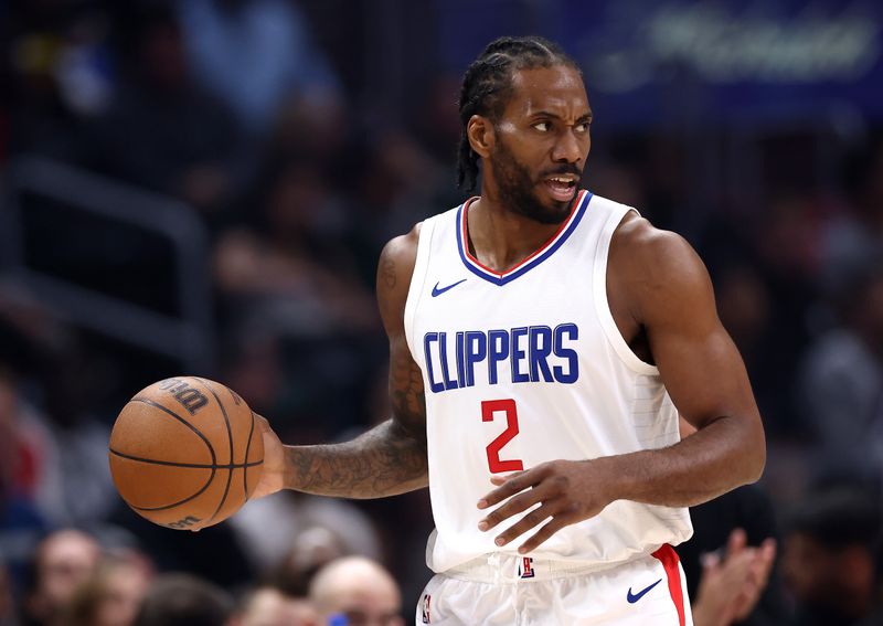 LOS ANGELES, CALIFORNIA - FEBRUARY 25: Kawhi Leonard #2 of the Los Angeles Clippers looks on during the first quarter against the Sacramento Kings at Crypto.com Arena on February 25, 2024 in Los Angeles, California. NOTE TO USER: User expressly acknowledges and agrees that, by downloading and or using this photograph, User is consenting to the terms and conditions of the Getty Images License Agreement.  (Photo by Katelyn Mulcahy/Getty Images)