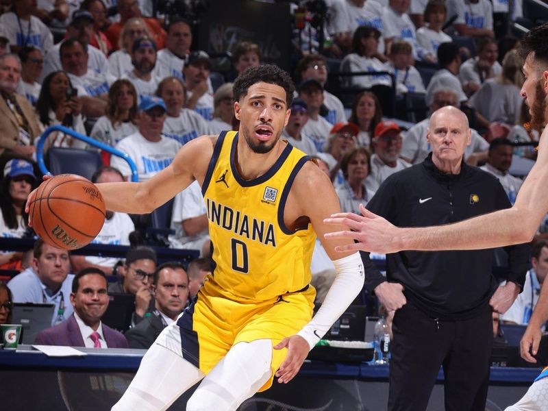 OKLAHOMA CITY, OK - JUNE 5: Tyrese Haliburton #0 of the Indiana Pacers handles the ball during the game against the Oklahoma City Thunder during Game One of the 2025 NBA Finals on June 5, 2025 at Paycom Center in Oklahoma City, Oklahoma. NOTE TO USER: User expressly acknowledges and agrees that, by downloading and or using this photograph, User is consenting to the terms and conditions of the Getty Images License Agreement. Mandatory Copyright Notice: Copyright 2025 NBAE(Photo by Nathaniel S. Butler/NBAE via Getty Images)