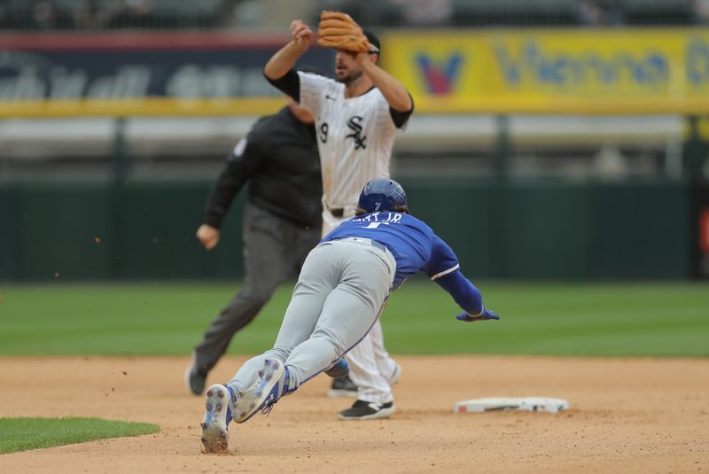 Apr 17, 2024; Chicago, Illinois, USA; Kansas City Royals shortstop Bobby Witt Jr. (7) steals second base in the eighth inning during game one of a double header against the Kansas City Royals at Guaranteed Rate Field. Mandatory Credit: Melissa Tamez-USA TODAY Sports