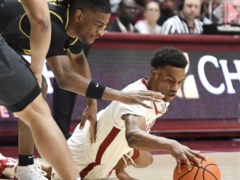 Jan 16, 2024; Tuscaloosa, Alabama, USA; Missouri forward Aidan Shaw (23) and Alabama guard Rylan Griffen (3) vie for control of a loose ball in their game at Coleman Coliseum. Mandatory Credit: Gary Cosby Jr.-USA TODAY Sports