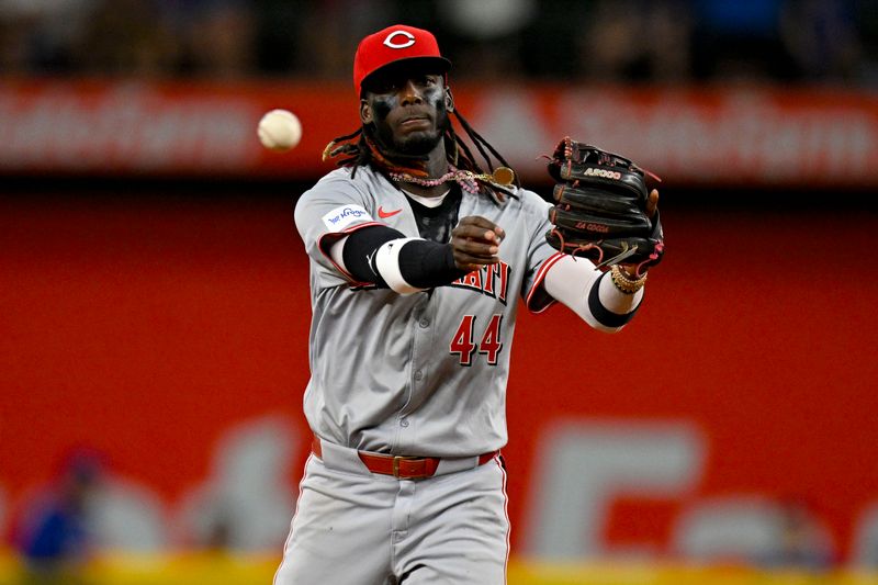 Apr 27, 2024; Arlington, Texas, USA; Cincinnati Reds shortstop Elly De La Cruz (44) warms up before the sixth inning against the Texas Rangers at Globe Life Field. Mandatory Credit: Jerome Miron-USA TODAY Sports