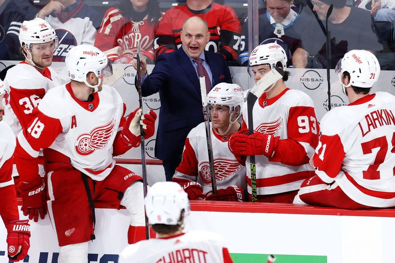 Dec 20, 2023; Winnipeg, Manitoba, CAN; Detroit Red Wings head coach Derek Lalonde gestures in the third period against the Winnipeg Jets at Canada Life Centre. Mandatory Credit: James Carey Lauder-USA TODAY Sports